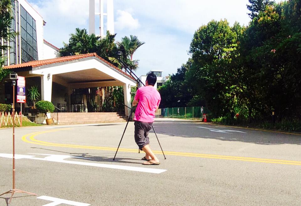Videographer doing a Church shoot from outside.